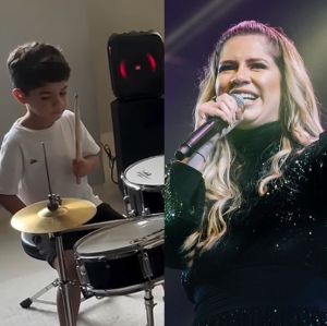 Léo, filho de Marília Mendonça, encanta ao tocar música da mãe durante aula de bateria: <i>O DNA dele não nega</i>