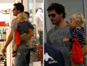 Papai: Thiago Lacerda no aeroporto com Gael