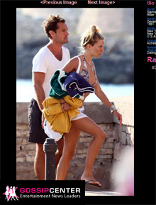 Itália: Jude Law e Sienna Miller aproveitam praia