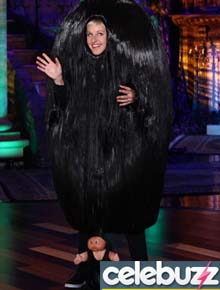Primo Itt?: DeGeneres aparece com peruca gigante