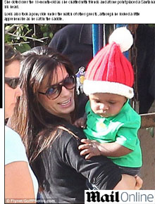 Touquinha: Sandra Bullock passeia com Louis