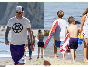 Em família: David Beckham leva os filhos à praia