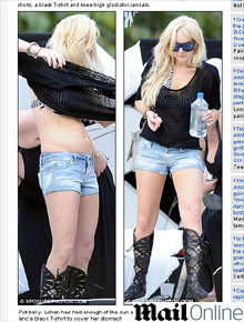 E as curvas?: Lindsay Lohan exibe barriguinha saliente