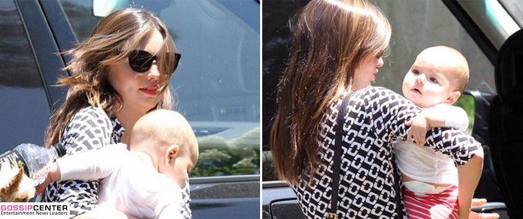 Miranda Kerr curte programa com a família