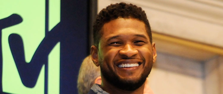Usher participa de festa na bolsa de valores