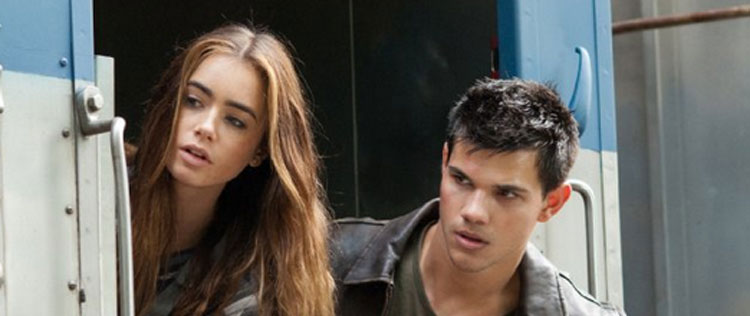 Taylor Lautner fala de cenas de romance com Lily Collins