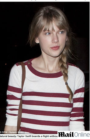 Taylor Swift passeia sem maquiagem