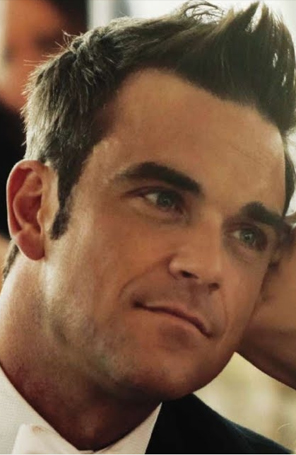 Robbie Williams chorou ao saber que será papai