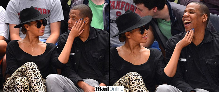 Beyoncé paparica Jay-Z durante jogo de basquete