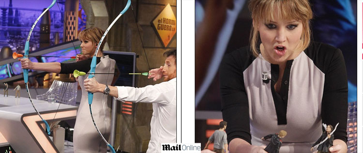 Jennifer Lawrence treina arco e flecha em programa