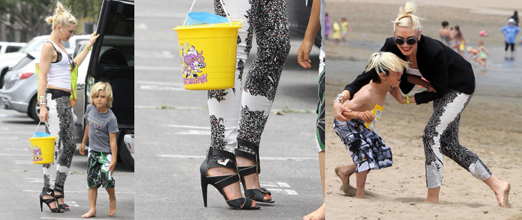 De salto, Gwen Stefani passeia com os filhos na praia