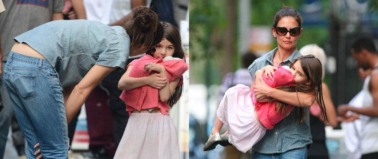 Suri Cruise faz birra novamente e Katie Holmes a carrega no colo