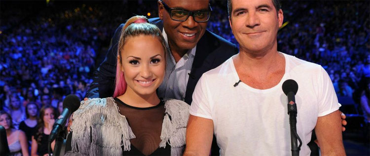 Simon Cowell incentiva romance entre Demi Lovato e músico do <i>One Direction</i>