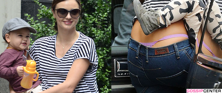 Miranda Kerr mostra <i>lingerie</i> ao sair com o filho