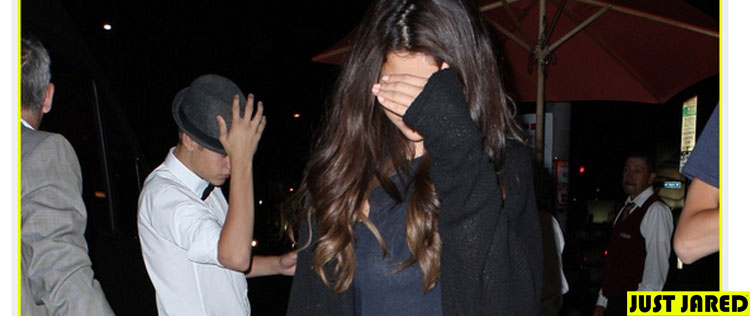 Justin Bieber e Selena Gomez se escondem dos fotógrafos