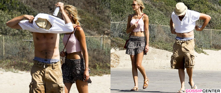 Leonardo DiCaprio coloca rapidamente a camisa ao avistar <i>paparazzi</i>