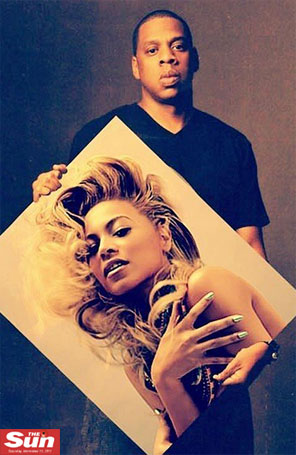 Beyoncé divulga imagem em que Jay-Z aparece segurando uma foto dela