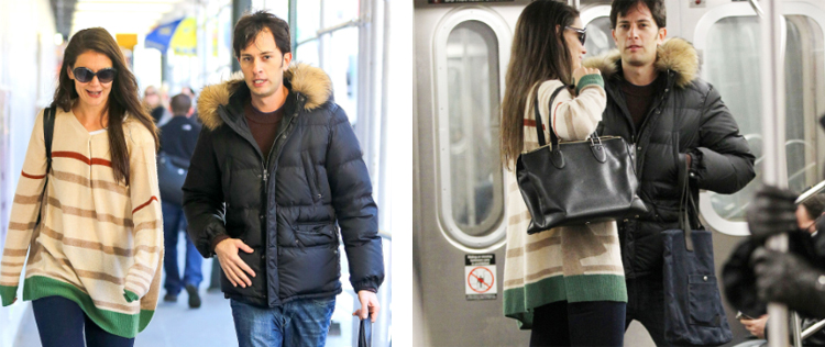 Katie Holmes anda de metrô acompanhada