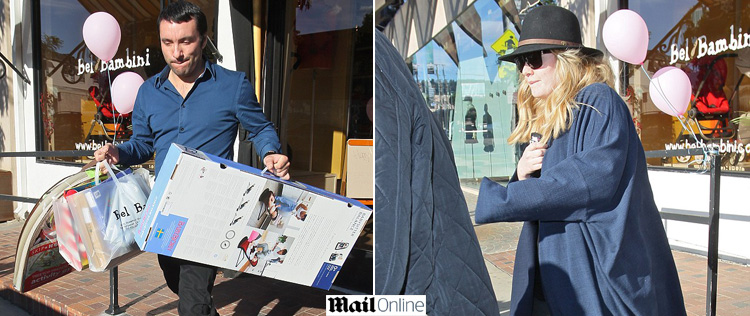 Adele faz compras para o filho em Beverlly Hills