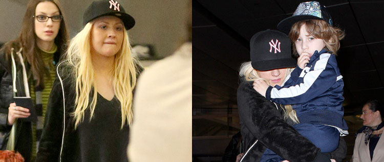 Sem maquiagem, Christina Aguilera desembarca com o filho em Los Angeles