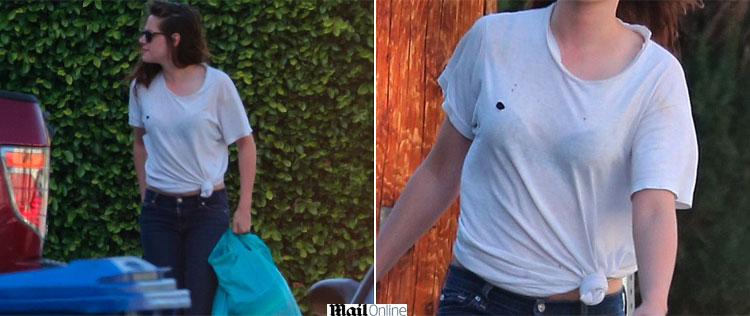 Kristen Stewart é fotografada com a camiseta furada