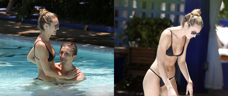 Candice Swanepoel aproveita piscina com namorado brasileiro