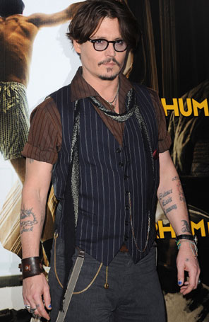 <i>-Minha pele é um jornal</i>, diz Johnny Depp sobre as suas tatuagens