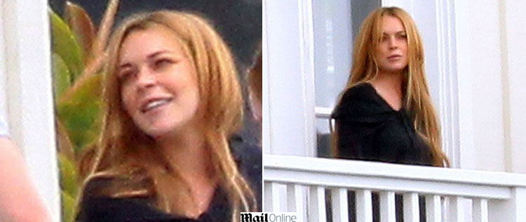 Sorrindo, Lindsay Lohan conversa com colegas da <i>rehab</i>, veja as fotos!