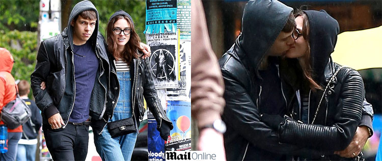 Keira Knightley e marido trocam beijo na chuva
