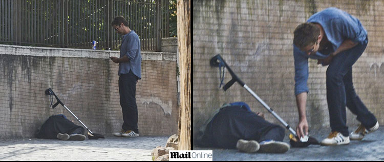 Gerard Butler é clicado enquanto ajuda morador de rua