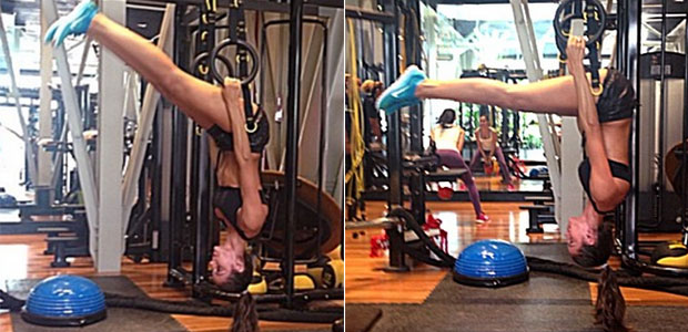 Izabel Goulart faz série de exercícios de ponta cabeça