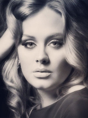 Adele planeja voltar aos palcos com turnê em 2015