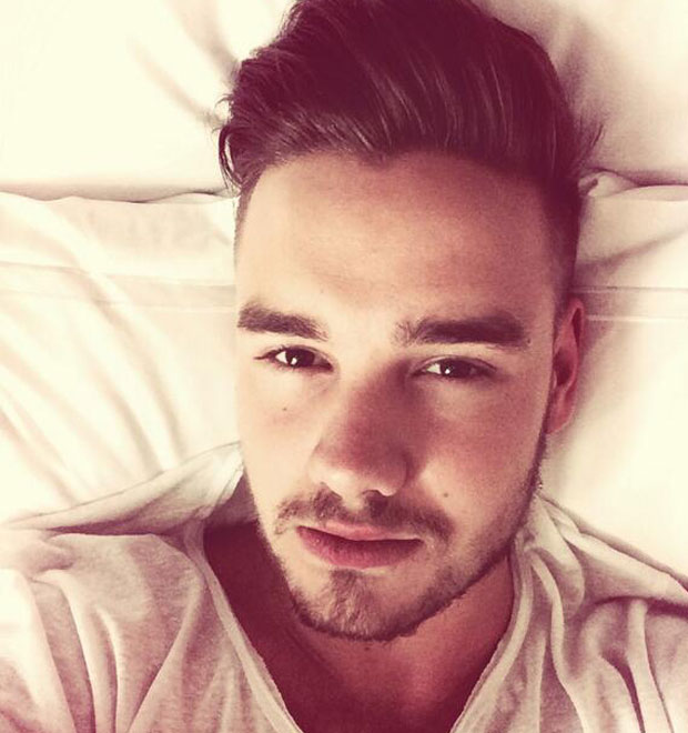 Liam Payne, do <i>One Direction</i>, chora em palco