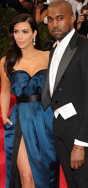 Kim Kardashian desmente boatos sobre seu casamento no <i>Twitter</i>