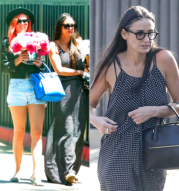 Com os cabelos brancos, Demi Moore é flagrada passeando com as filhas