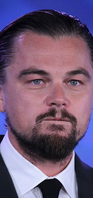 Leonardo DiCaprio briga por foto com Nelson Mandela