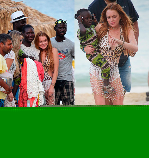 Lindsay Lohan tira fotos com locais e carrega criança no colo em viagem à Grécia