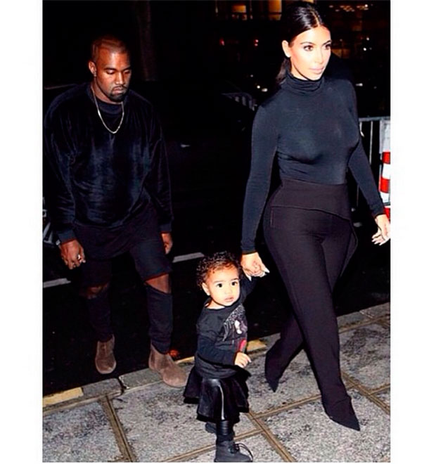 Kim Kardashian e Kanye West levam North West ao seu primeiro desfile de moda
