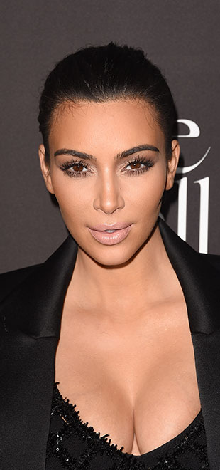 Kim Kardashian perde a paciência e resolve esclarecer alguns rumores antes de começar 2015