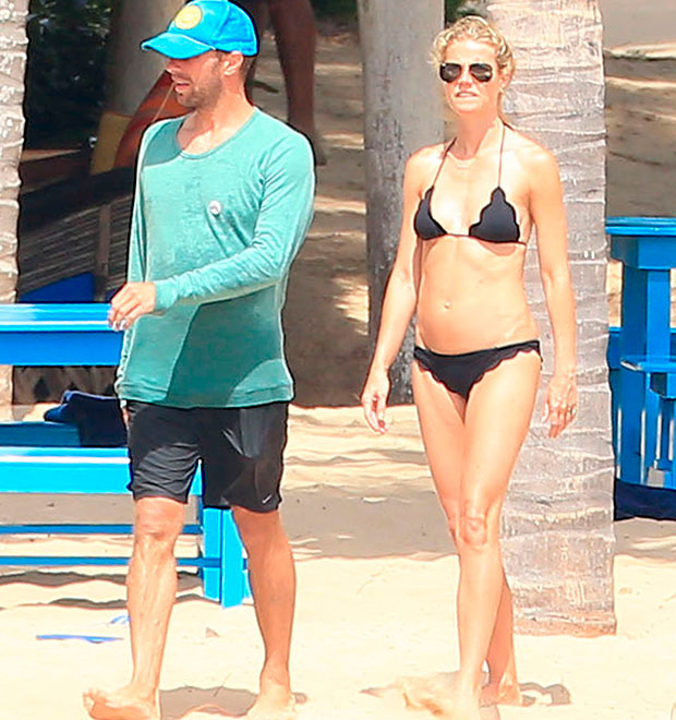 Gwyneth Paltrow exibe a boa forma em férias com a família