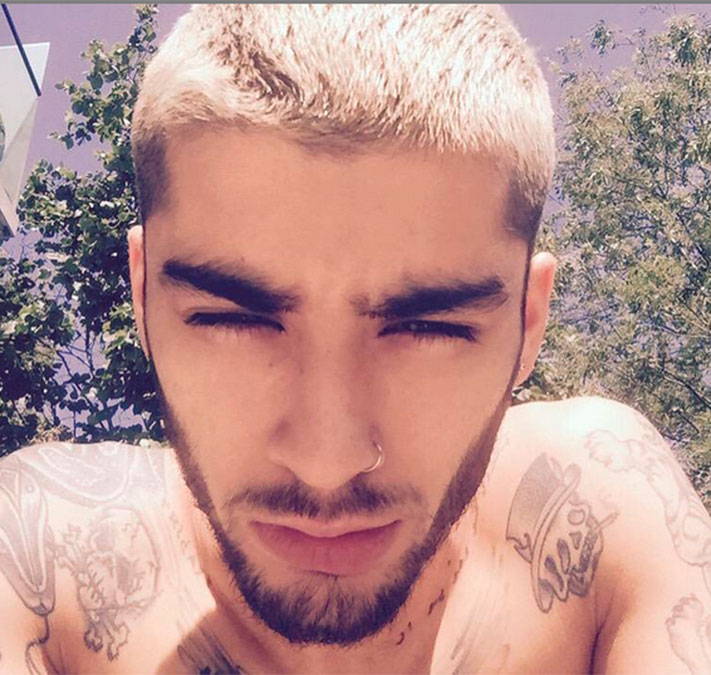 Zayn Malik mostra que tatuagens é com ele mesmo