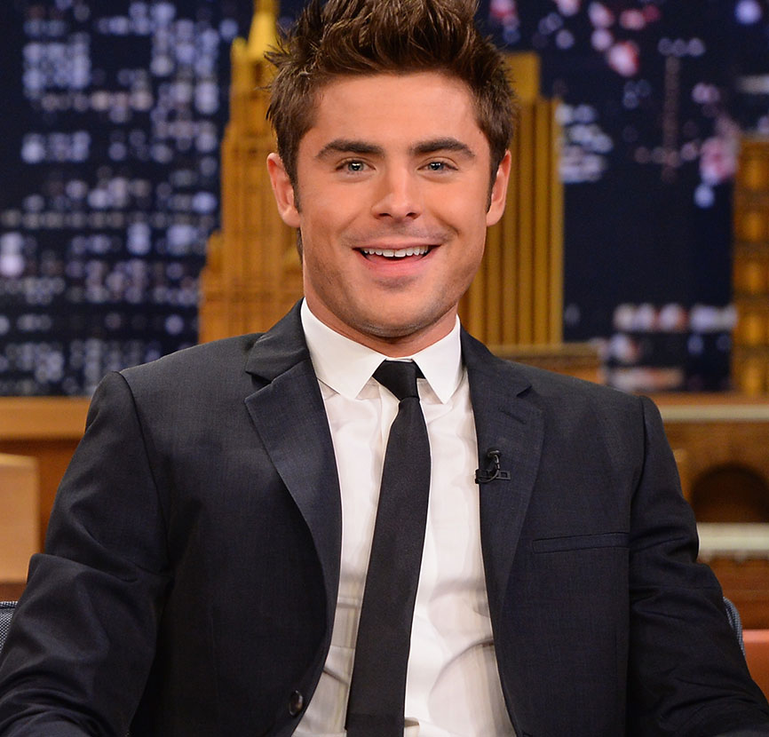 Zac Efron deve salvar vidas - e com o tanquinho de fora!