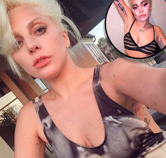 Lady Gaga cansou das suas tatuagens no braço? Descubra aqui!