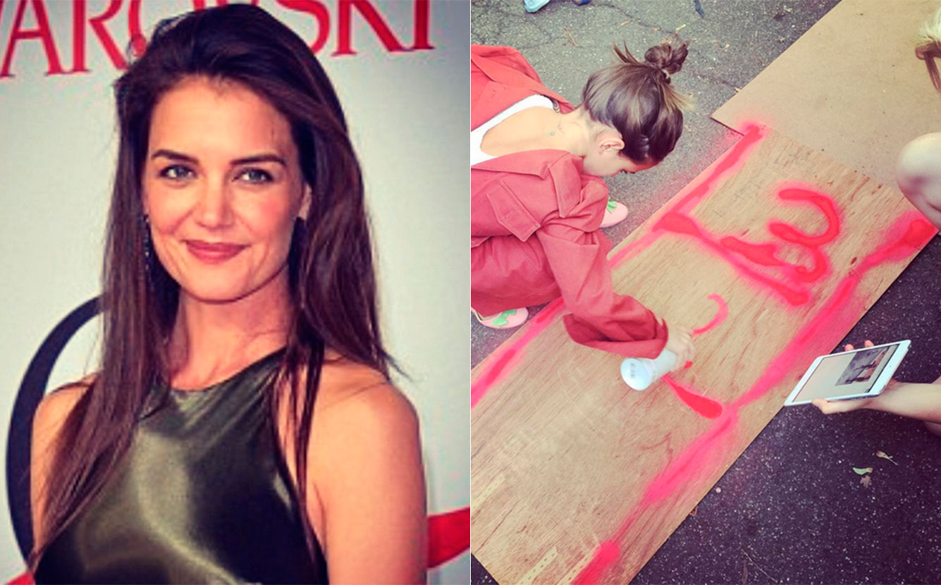 Filha de Katie Holmes, Suri pinta o sete com <i>spray</i> na mão