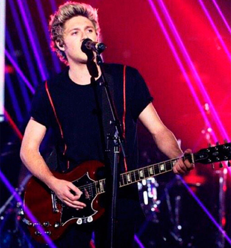 Integrante da <i>One Direction</i> se irrita com <i>paparazzi</i>