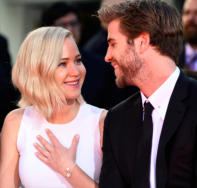 Liam Hemsworth revela que Jennifer Lawrence fazia perguntas indiscretas nos <I>sets</I> de <I>Jogos Vorazes</I>