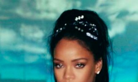 Rihanna distribui pizzas e toalhas para fãs que esperavam por seu <i>show</i> embaixo de uma tempestade!