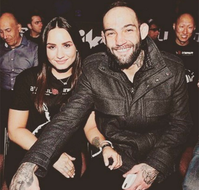 Demi Lovato assiste luta e apoia suposto <I>affair</I>, o lutador brasileiro Guilherme Bomba