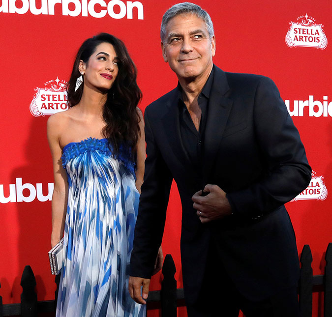 George Clooney exibe foto dos filhos a amigos durante <i>première</i>, saiba mais!