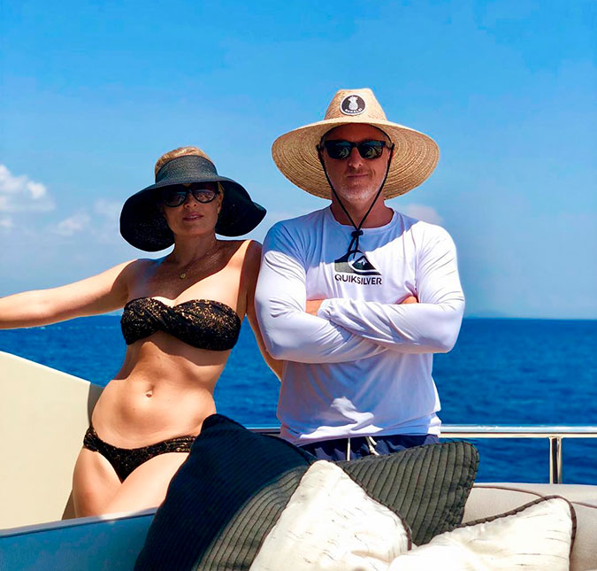 De biquíni, Angélica posta foto com Luciano Huck relembrando férias e mostra barriga chapada
